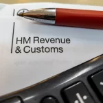 picture of hmrc letter under keyboard