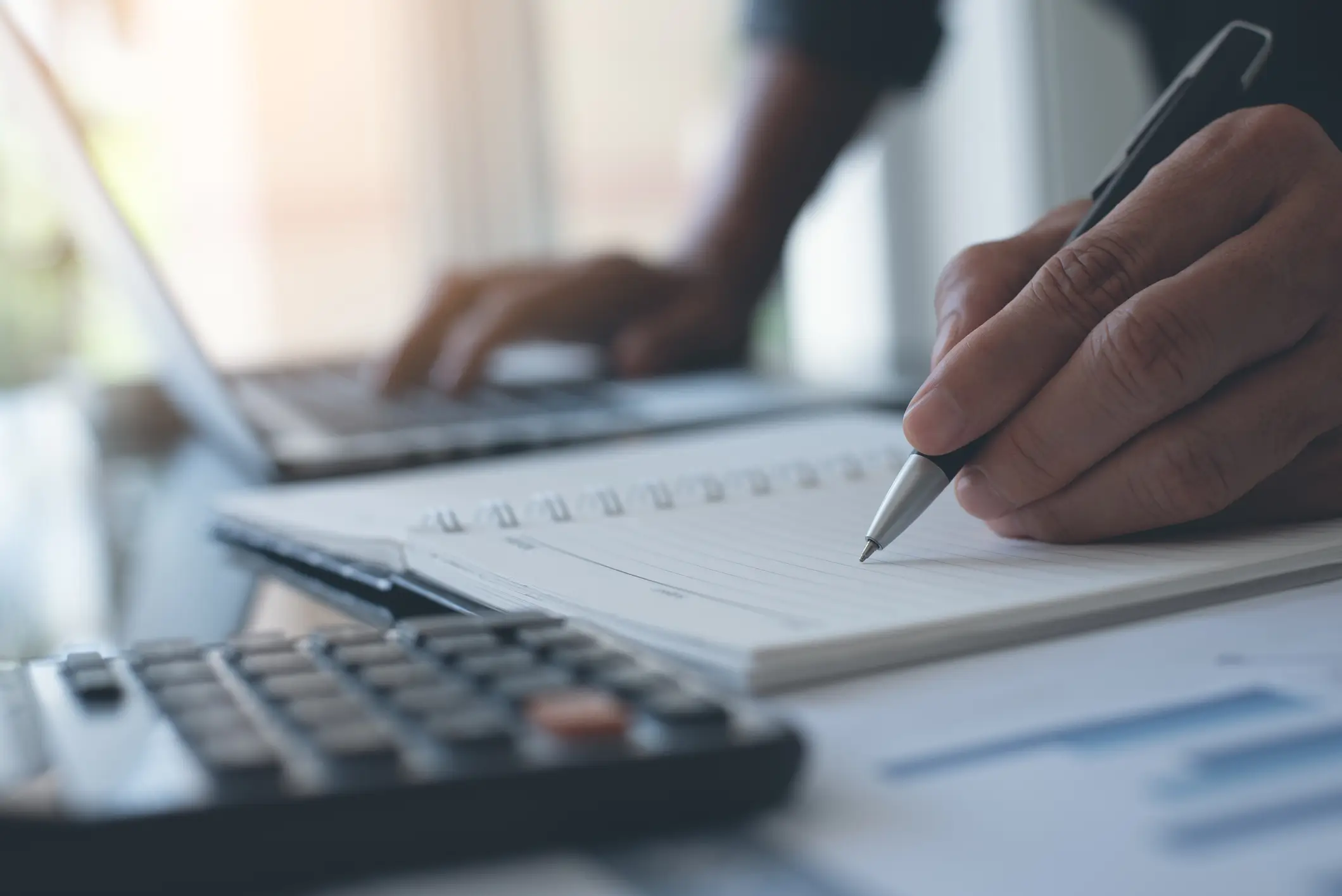 picture of person working out solicitor fees