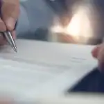 person signing a settlement agreement contract